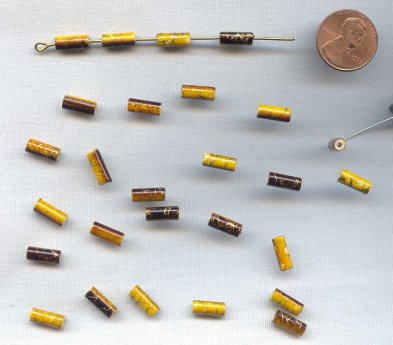 YELLOW BROWN GOLD DRIZZLE 10x4mm. TUBE BEADS - Lots of 24