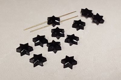BLACK 9x3mm. FACETED TOP 2 HOLE STAR BEADS - Lots of 24
