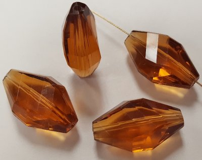 TOPAZ 20X12MM MULTI FACETED TWISTED BEADS - Lots of 12