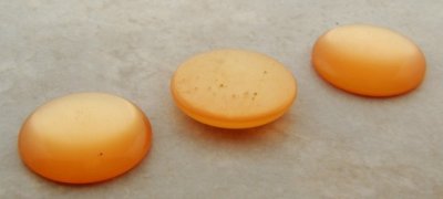26mm. ORANGE MOONSTONE ROUND CABOCHONS - Lot of 36